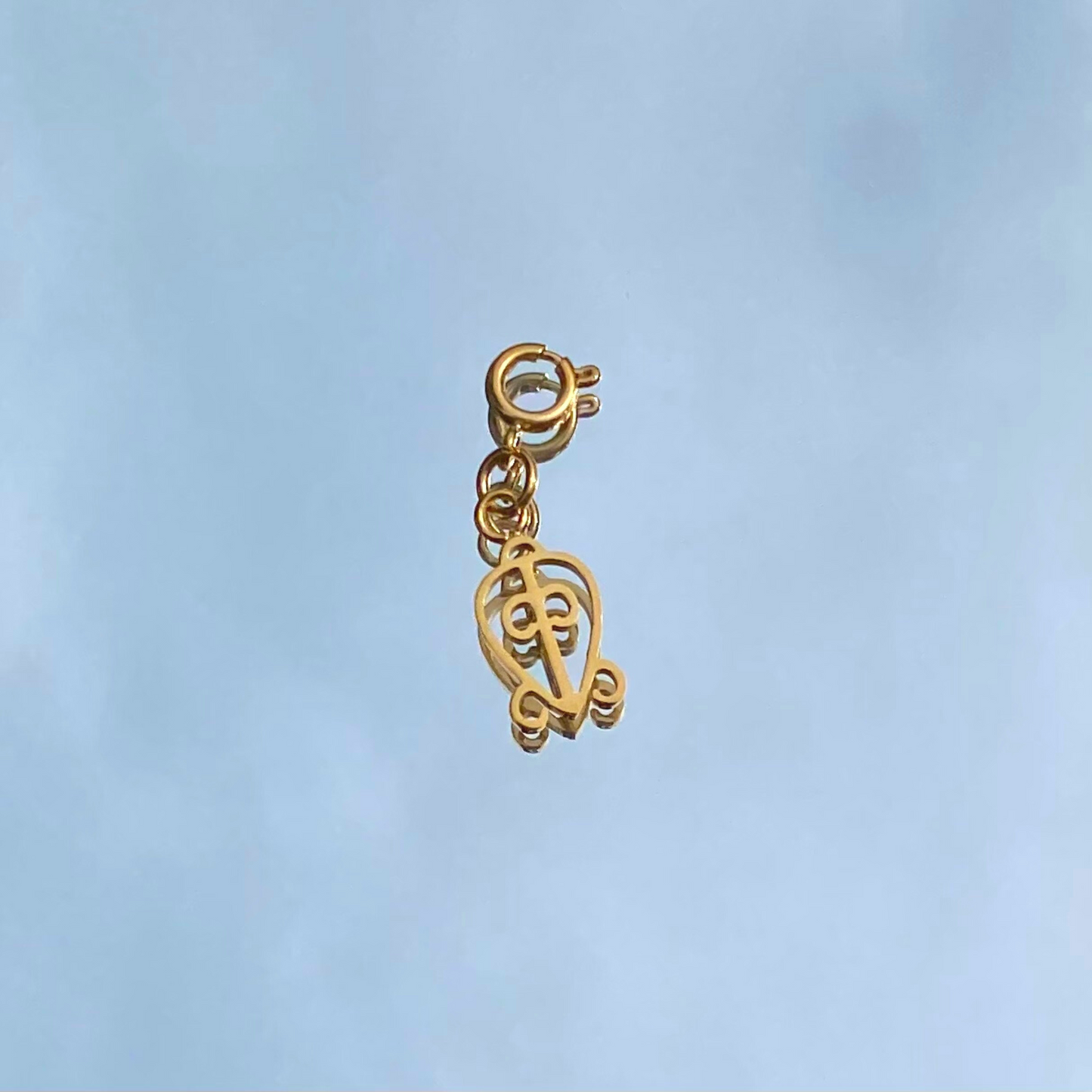 Odo Nnyew Fie Kwan Adinkra Charm